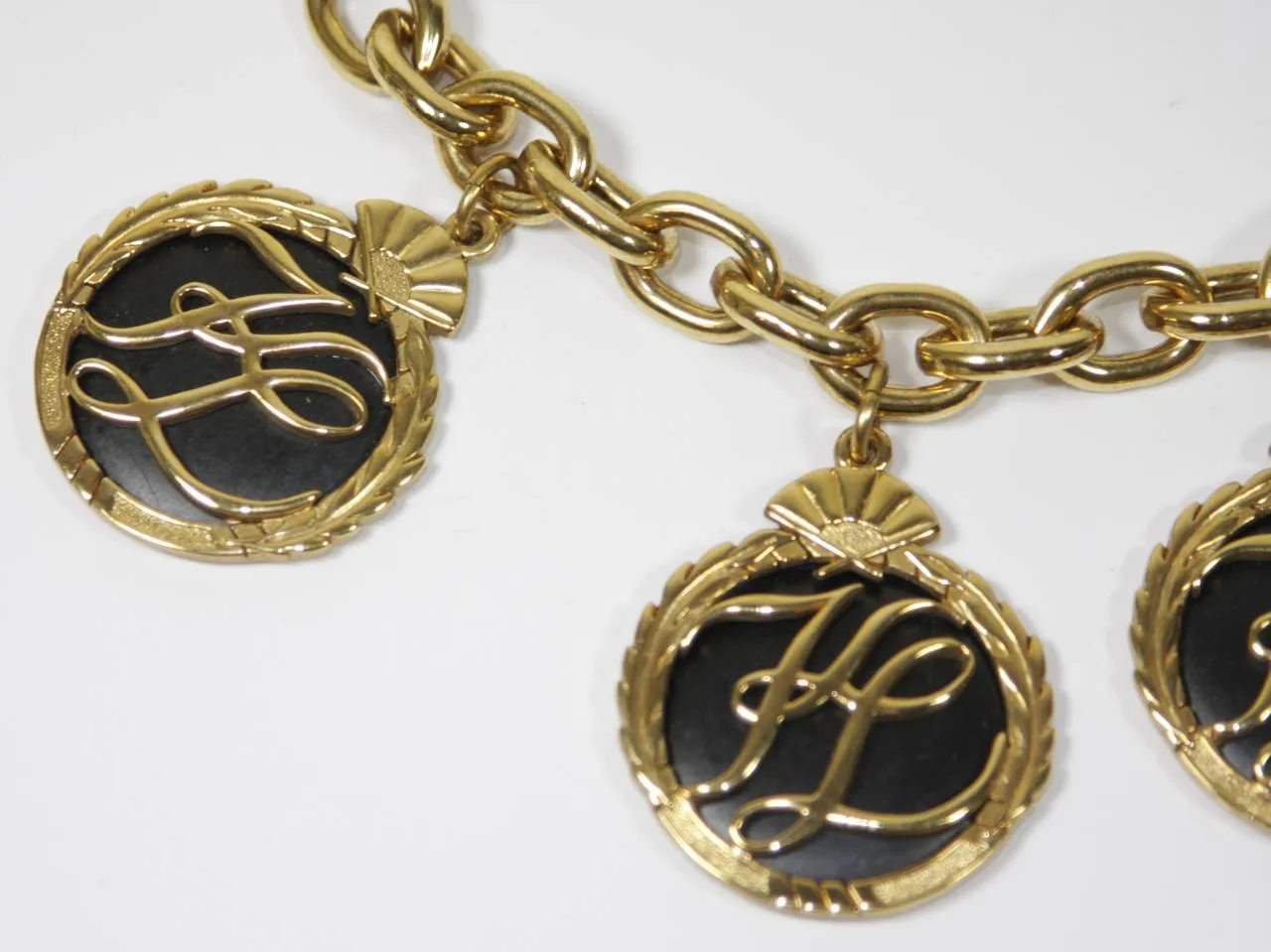 KARL LAGERFELD 1980s Gold Tone Charm Bracelet with Toggle Closure